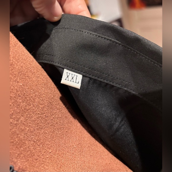 Simple black men’s shirt only worn once 2XL—dress it up
or dress it ups it down! - Picture 4 of 6